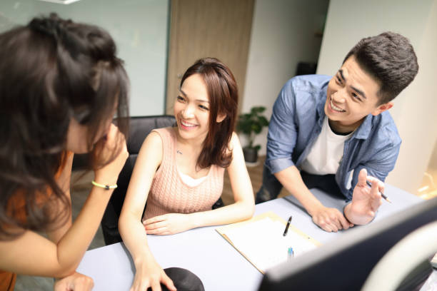 istock Group of business persons in discussion 1248781326