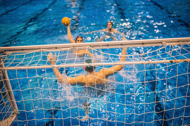 istock Young men playing water polo 1248782297