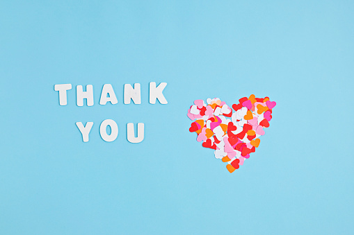 istock Hearts confetti and text thank you. Love, gratitude, expressing gratitude to doctors and nurses 1248782363