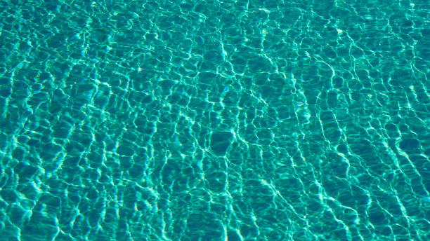 istock glare of pool water as background texture 1248783893