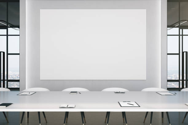 istock Blank poster on wall in conference office 1248786019