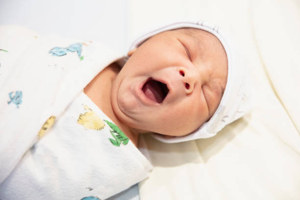istock new born baby at hospital 1248789772