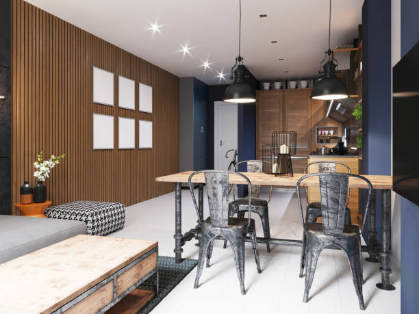 istock Dining area in the kitchen with deep blue walls with an iron table and chairs, in an industrial loft style. 1248794317