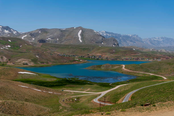 istock Snowy mountain and lake views 1248798161