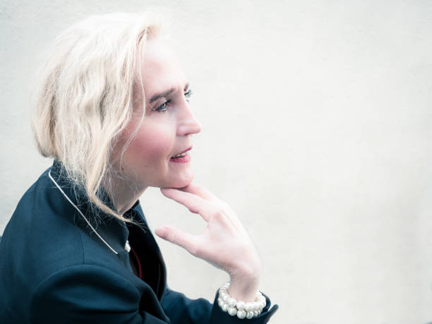 istock classy mature woman closeup 1248799989