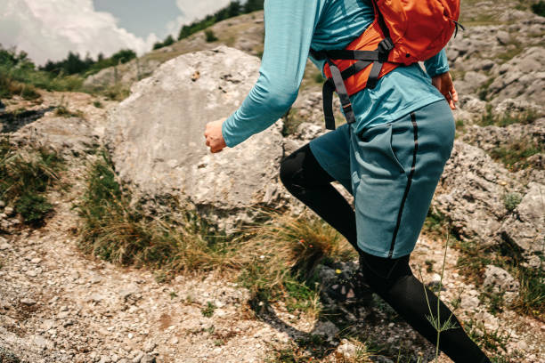 istock Man running on rocky hill 1248805838