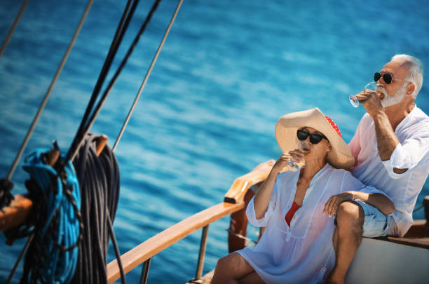 istock Senior couple on a sailing cruise 1248805936