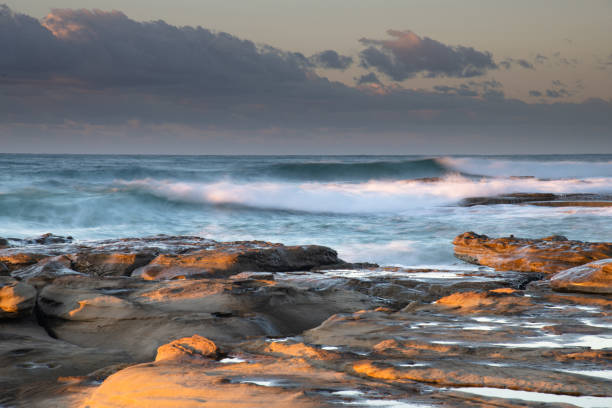 istock Sunrise Seascape with a low cloud bank 1248806818