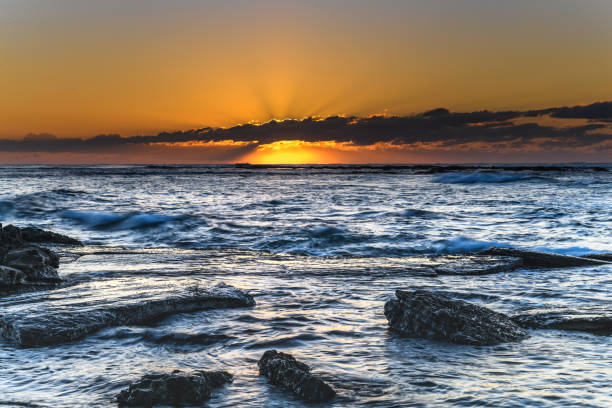 istock Sunrise Seascape with a low cloud bank 1248806855