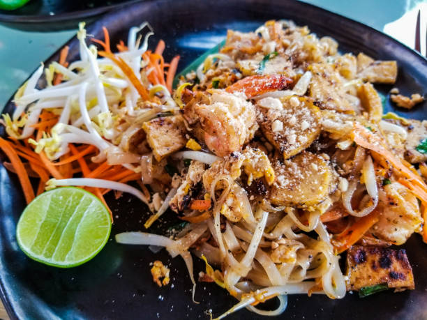istock Pad Thai meal with vegetables and lime 1248811972