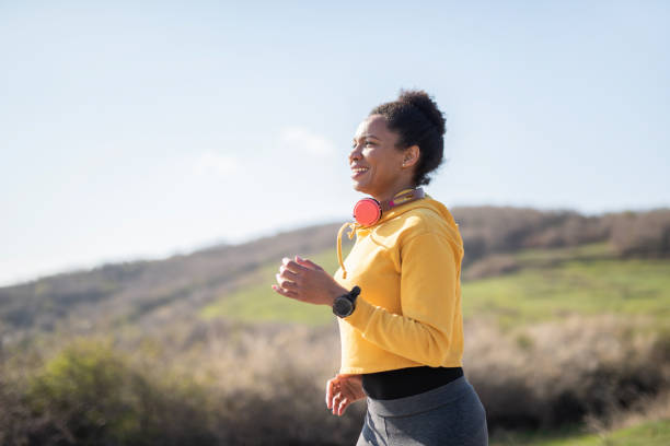 istock Woman running in nature. 1248814151