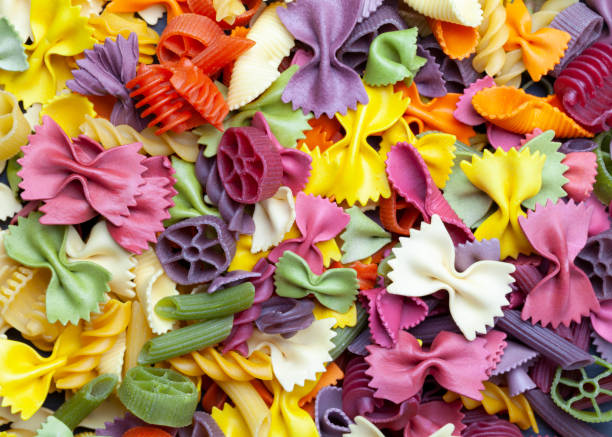 istock Colorful pasta mix texture background wallpaper 1248817819