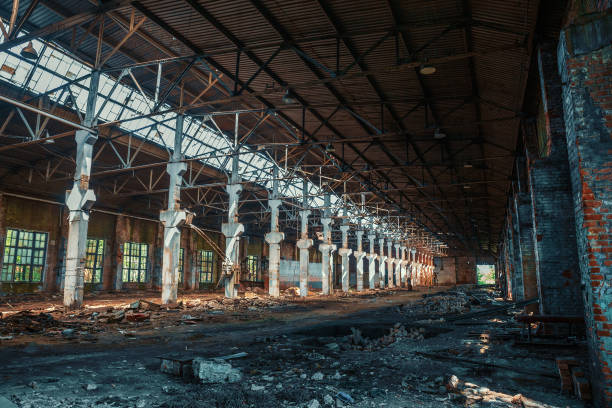 istock Dirty abandoned ruined industrial building inside 1248818655