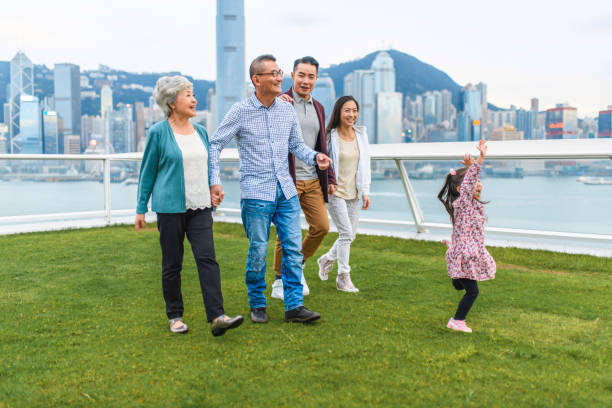 istock Chinese Family Enjoying View from Ocean Terminal Deck 1248826299