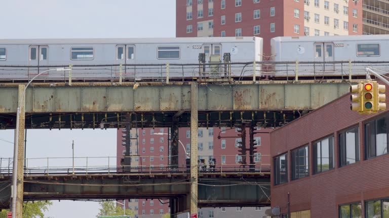 Bus and subway passing same time in New York city