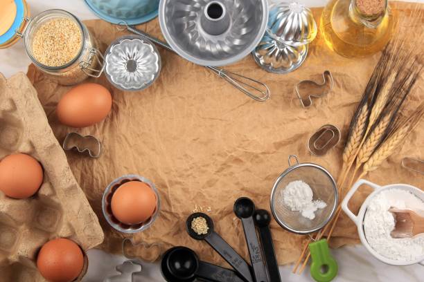 istock Baking Background with Baking Ingredients such as Egg, Sesame Seed, Flour, Oil, and Baking Utensils. Suitable for Background or Wallpaper 1248842175