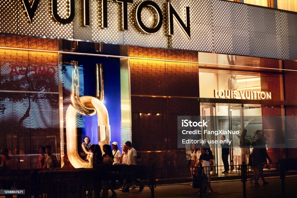 Crowd Of People Walking By Louis Vuitton Luxury Store Hong Kong Stock Photo  - Download Image Now - iStock