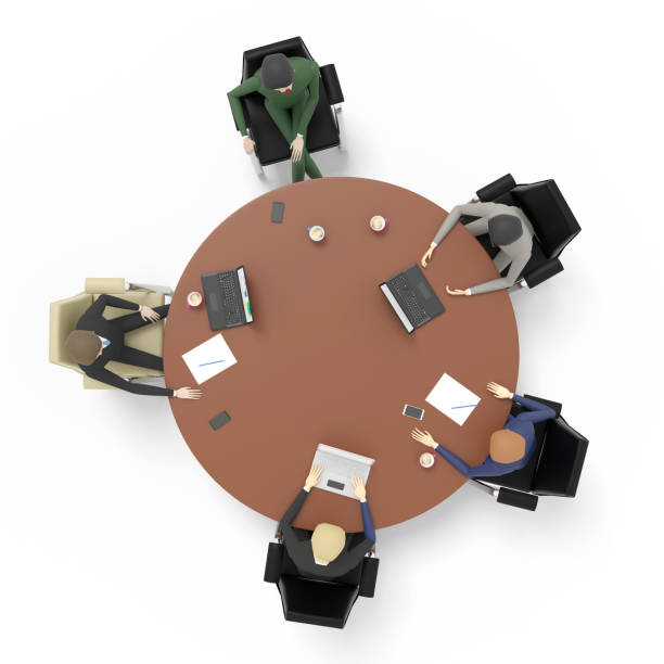 istock Businessmen are conferring at the round table. View from above. White background. 3D illustration 1248850604