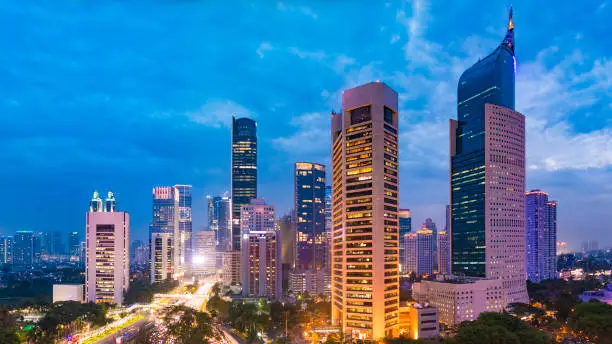 Photo of Aerial view of Jakarta Central Business District at sunset.