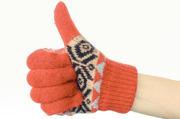 hand of woman in gloves showing thumbs up. white background. womanly clothes - womanly imagens e fotografias de stock