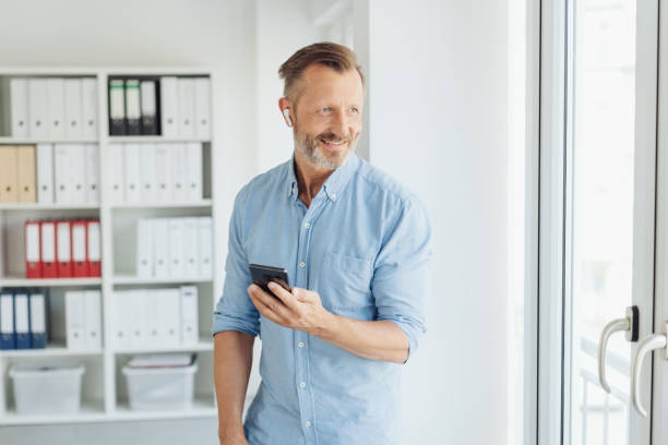 istock Smiling relaxed businessman taking a break 1248878673
