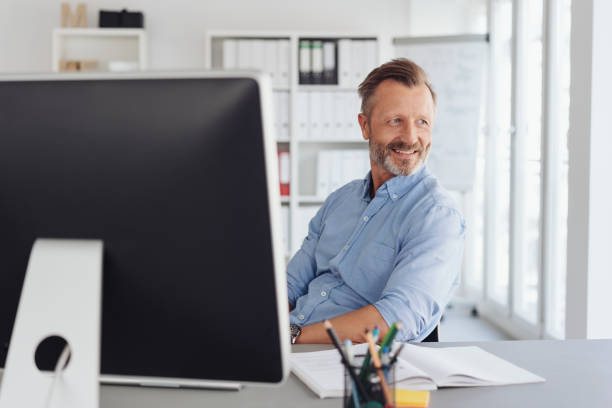 istock Relaxed businessman watching in amusement 1248878838