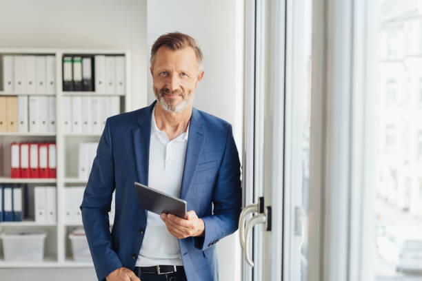 istock Smart relaxed confident senior businessman 1248878865