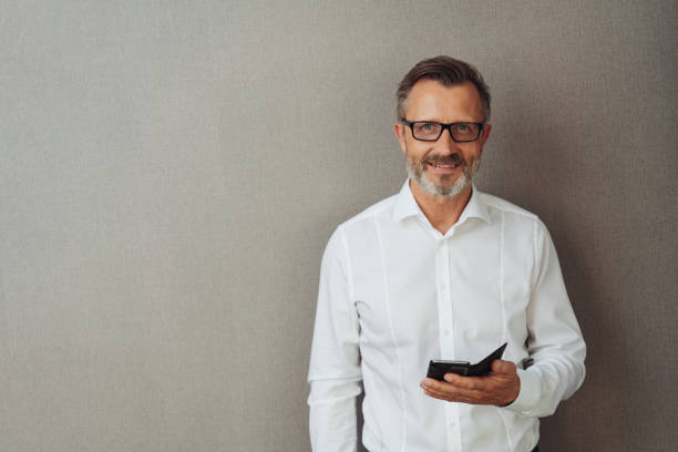 istock Thoughtful bearded man wearing glasses 1248878900
