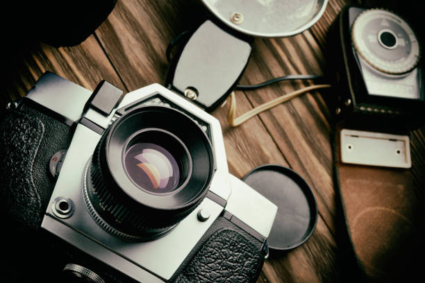 istock Old vintage photo camera, flash and exposure meter 1248881413