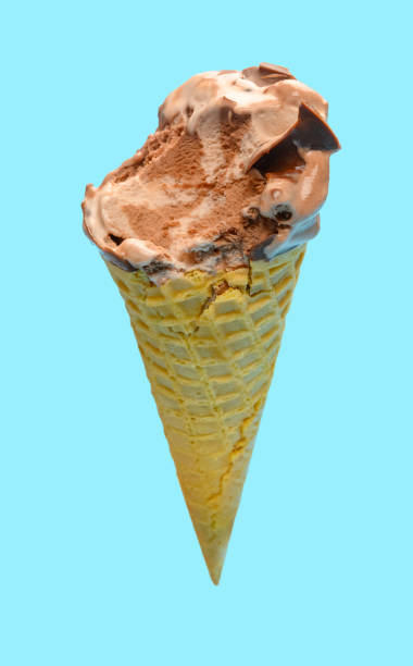 istock side view fresh chocolate flavor ice cream cone with some bites on a blue background 1248883537