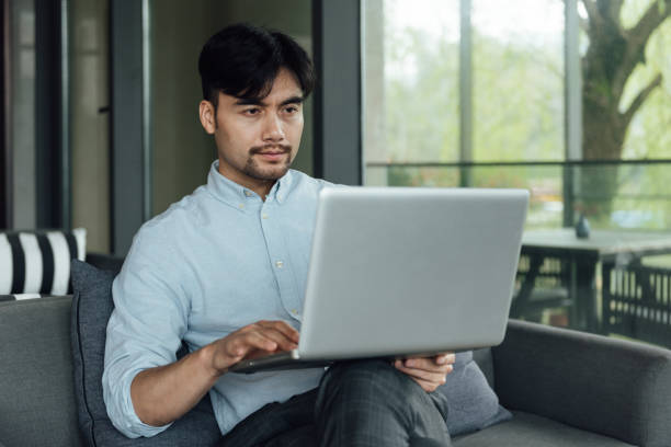 istock A young Asian business man is working 1248883704