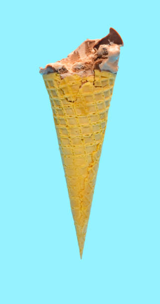 istock side view fresh chocolate flavor ice cream cone with some bites on a blue background 1248884593