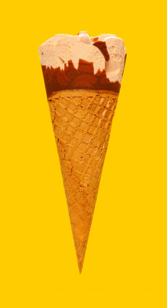 istock side view milk tea flavor ice cream cone on a yellow background 1248886129