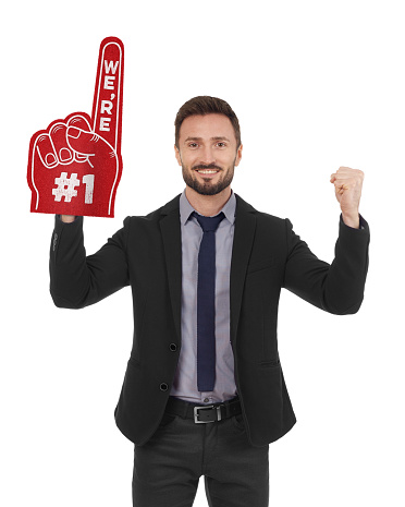 Business man with fan foam hand isolated on white