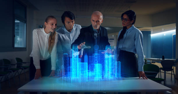 istock A group of designer are using a futuristic sophisticated technology screen with augmented reality holograms for a new worldwide global project realization in an office. 1248887500