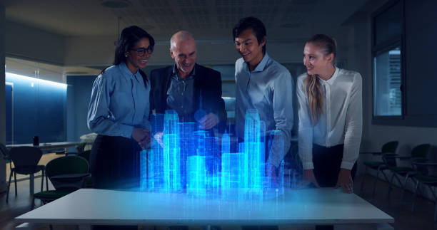 istock A group of designer are using a futuristic sophisticated technology screen with augmented reality holograms for a new worldwide global project realization in an office. 1248887560