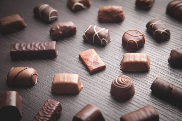 istock Chocolate candies. Sweet food. Background 1248887563