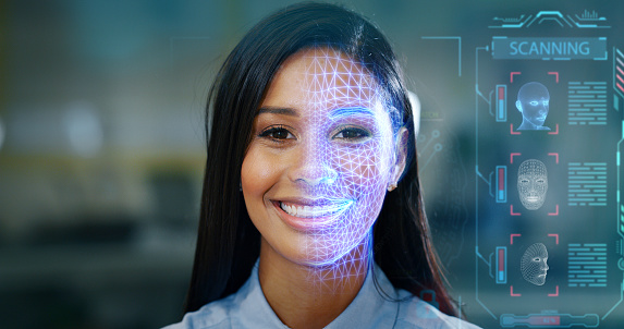 Futuristic and technological scanning of the face of a beautiful woman for facial recognition and scanned person. It can serve to ensure personal safety. Concept of:  future, security, scanning.