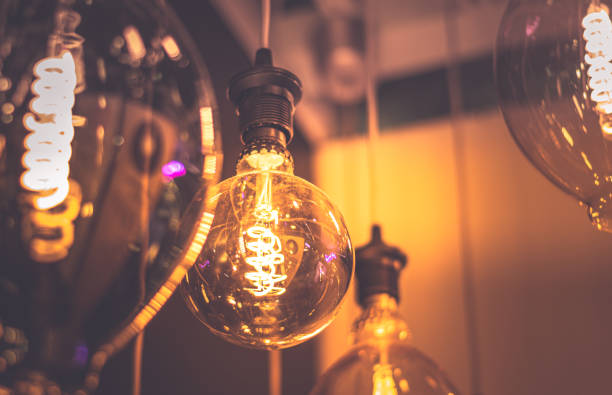 istock Close-Up of Illuminated Light Bulbs 1248890889
