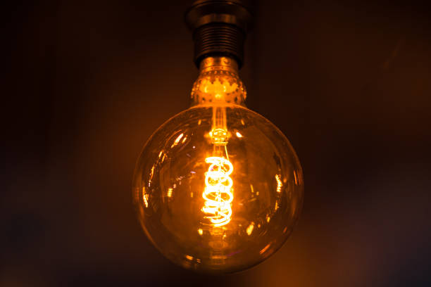 istock Close-Up of Illuminated Light Bulbs 1248890891