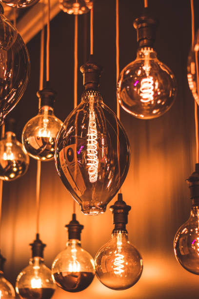 istock Close-Up of Illuminated Light Bulbs 1248891451