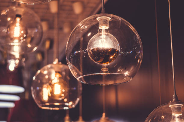 istock Close-Up of Illuminated Light Bulbs 1248891453