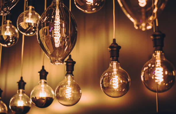 istock Close-Up of Illuminated Light Bulbs 1248891612