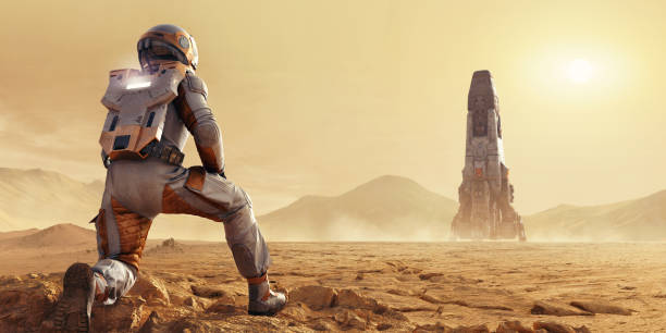 istock Astronaut On Mars Kneeling Looking At Space Rocket In Distance 1248892852