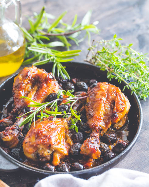 istock Italian Chicken cacciatore, with black olives, capers, tomatoes, garlic and herbs. 1248896830