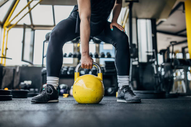 istock Close up of woman training with kettlebell 1248896894