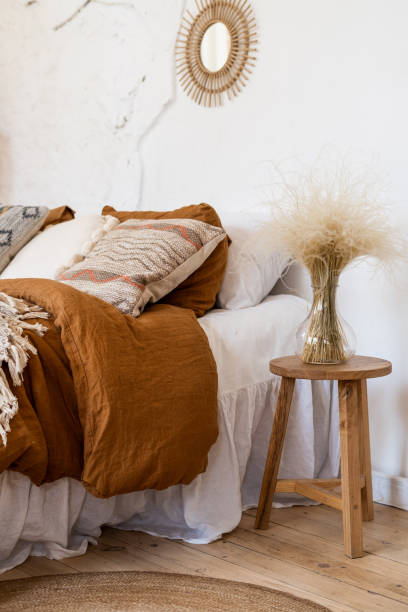 istock Cozy apartment in boho chic style interior with comfort bedroom 1248900665