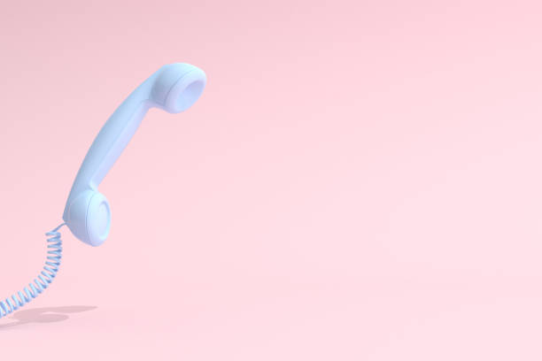 istock Mock up of telephone on pink background. 3D rendering. 1248901285