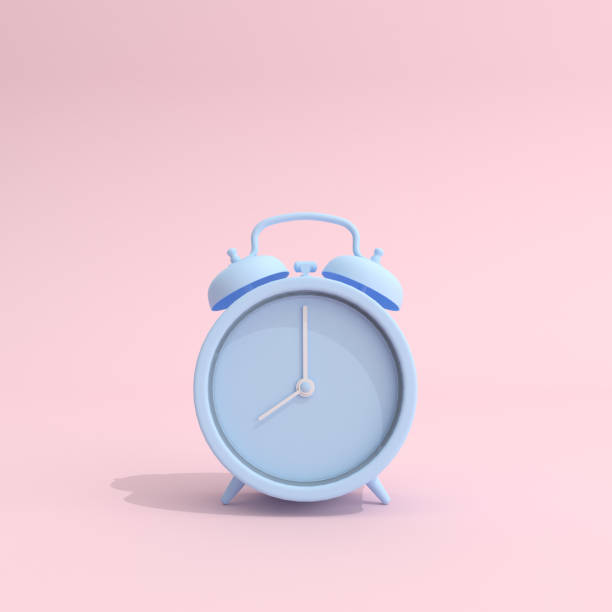 istock Mock up of blue alarm clock on pink background.3D rendering. 1248901286