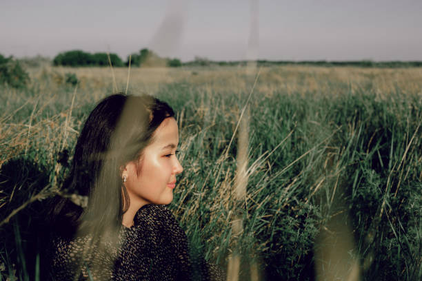 Beautiful Asian woman in the top of hill